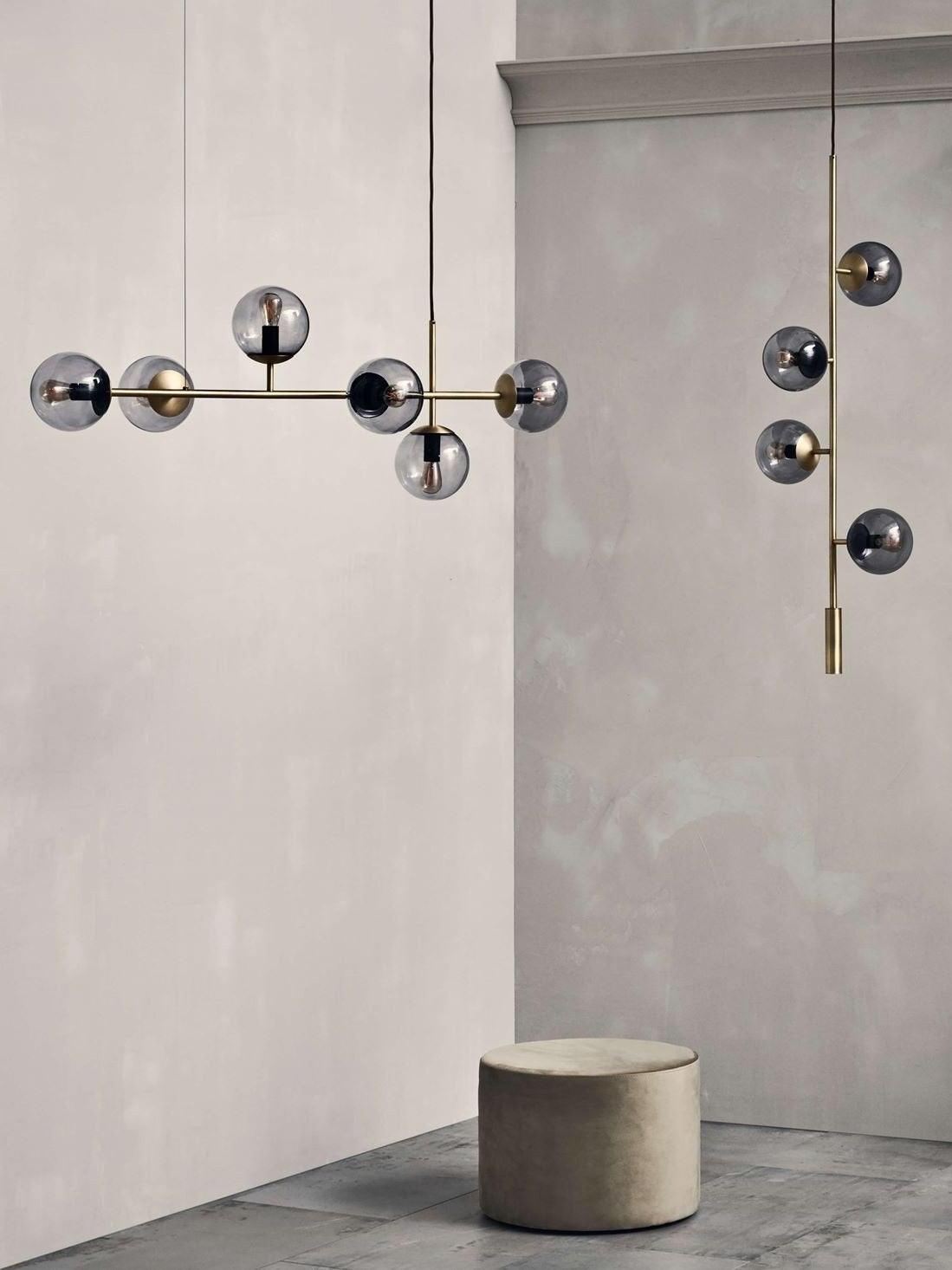 Horizontal and vertical globe fixtures shown together