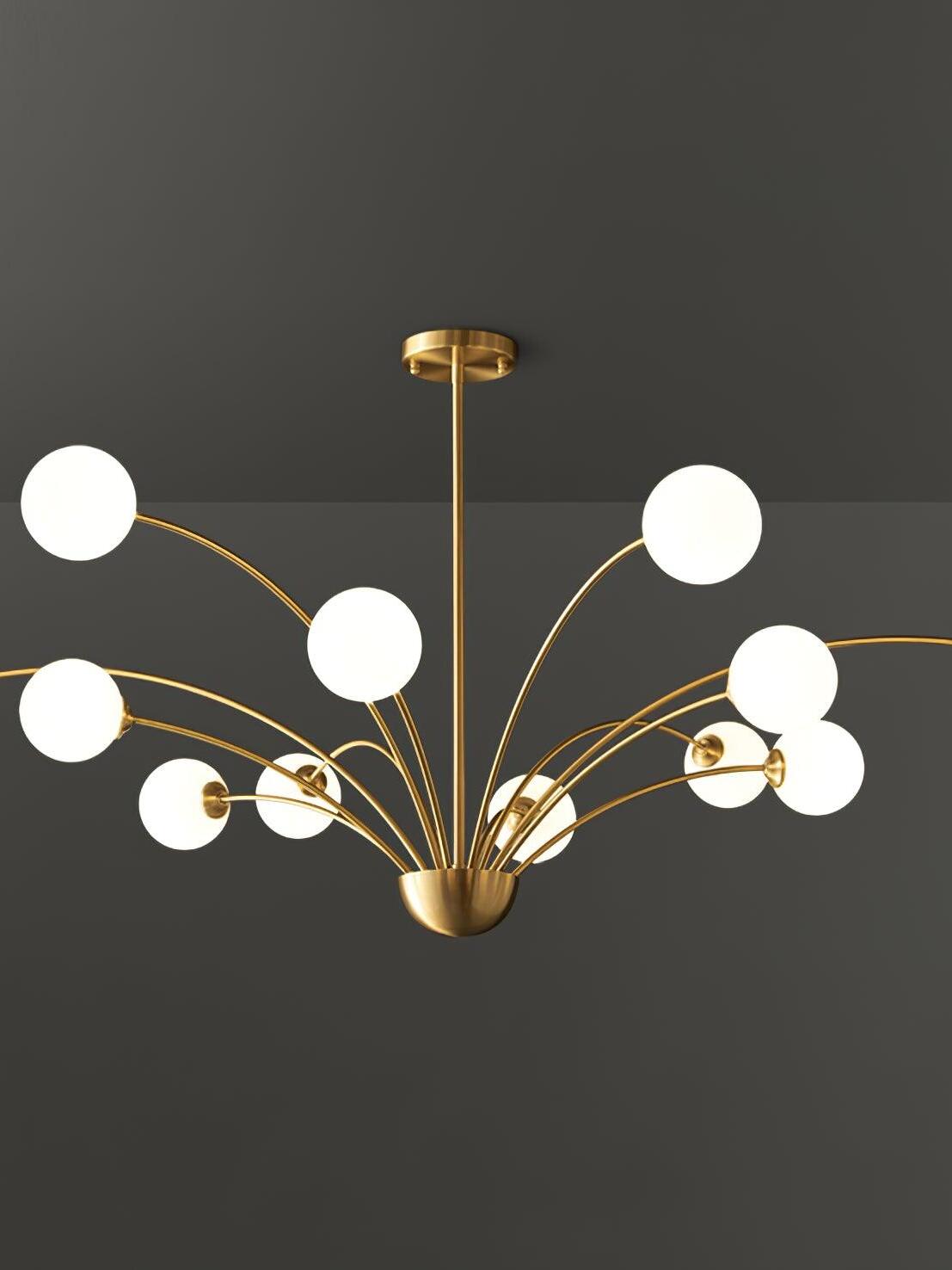 Broad white-globe chandelier with a central front globe, brass-tone arms and cropped outer globes