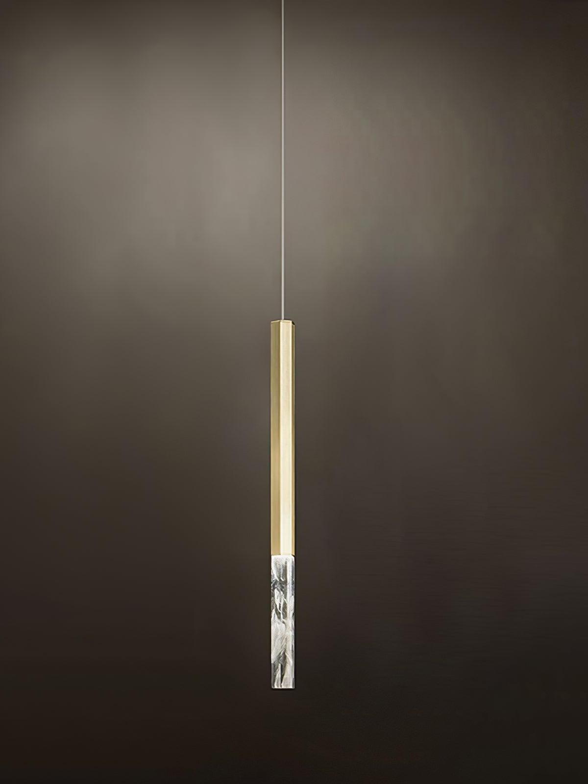 Single gold vertical pendant with a clear lower block