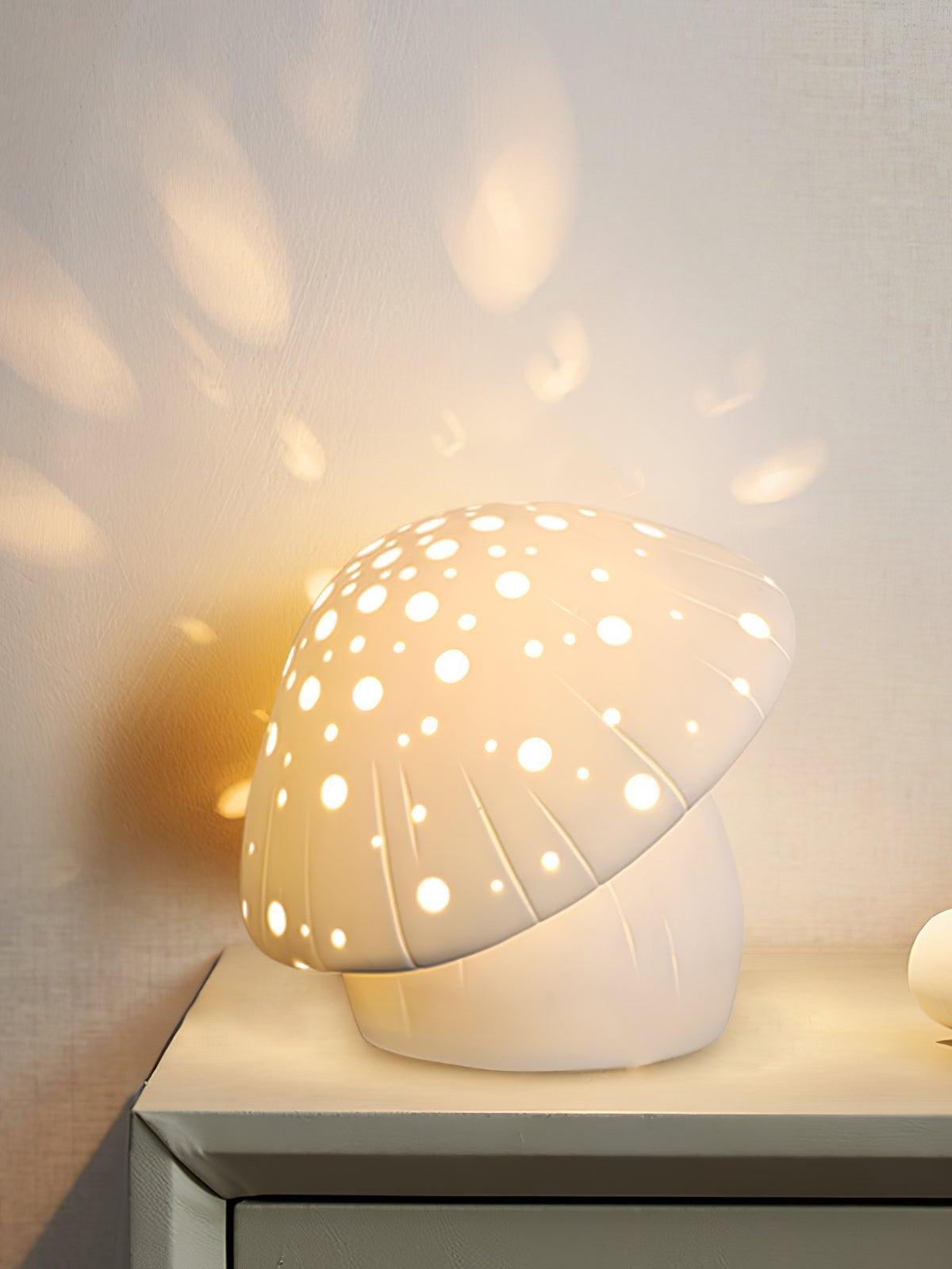 Fungo lamp on a cabinet casting spots of light onto the adjacent wall
