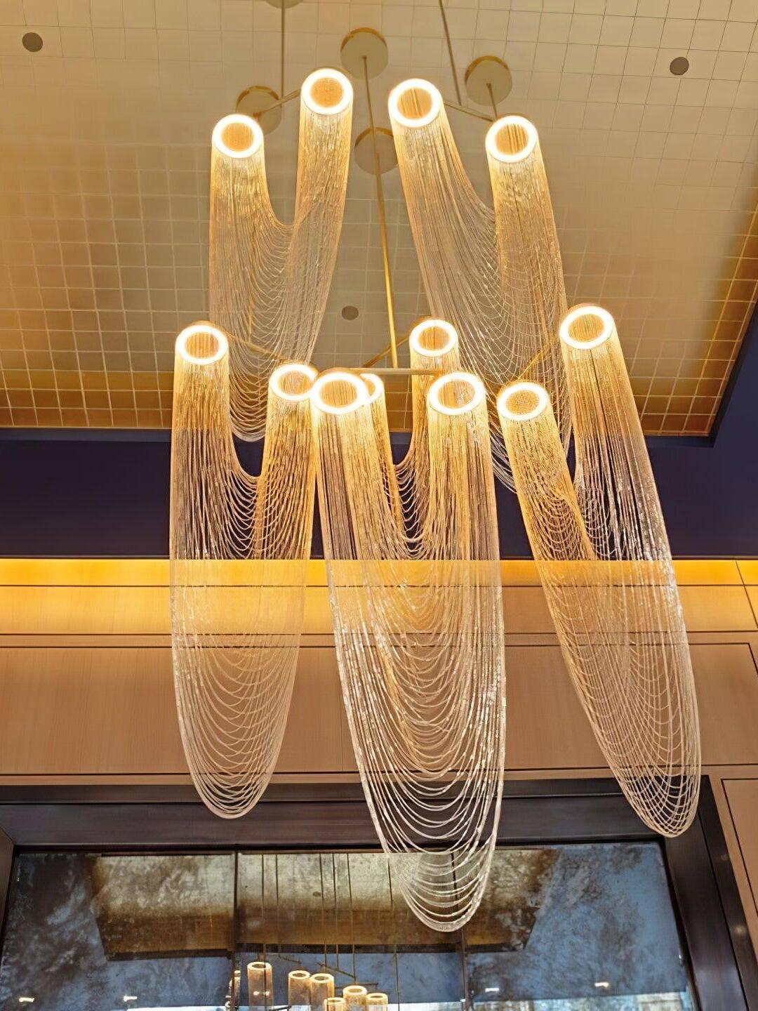 Multiple illuminated chain loops in a showroom