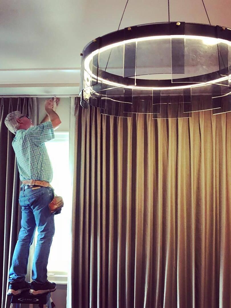 Stratos ring chandelier during indoor installation