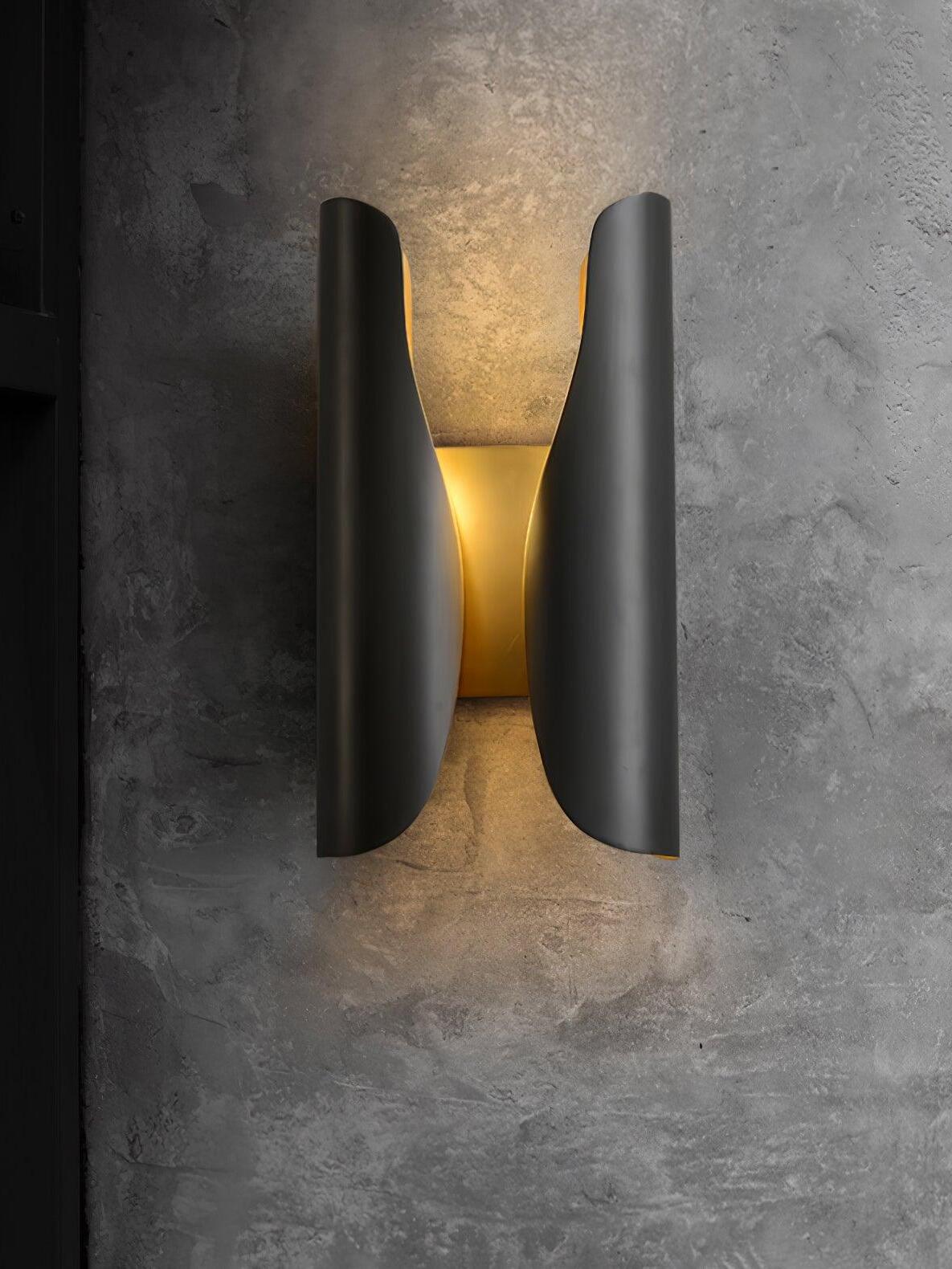 Blackened Guardian sconce on a textured wall