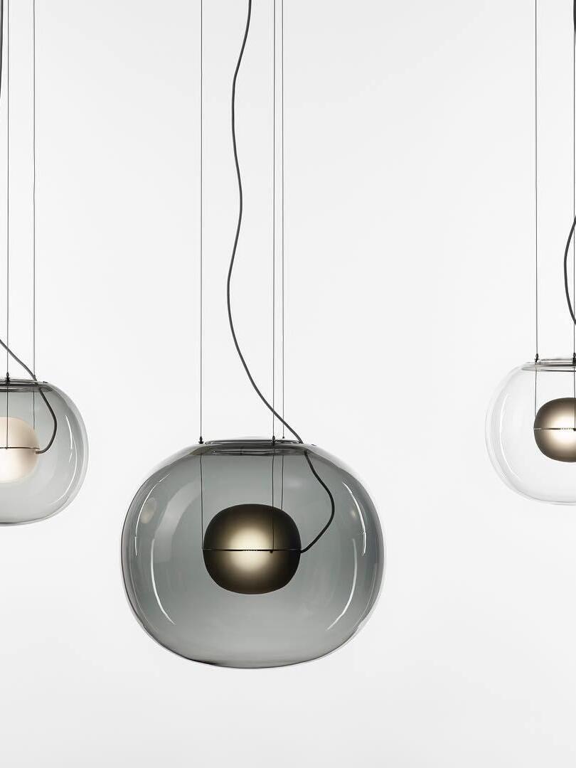 Three globe pendants with small inner spheres