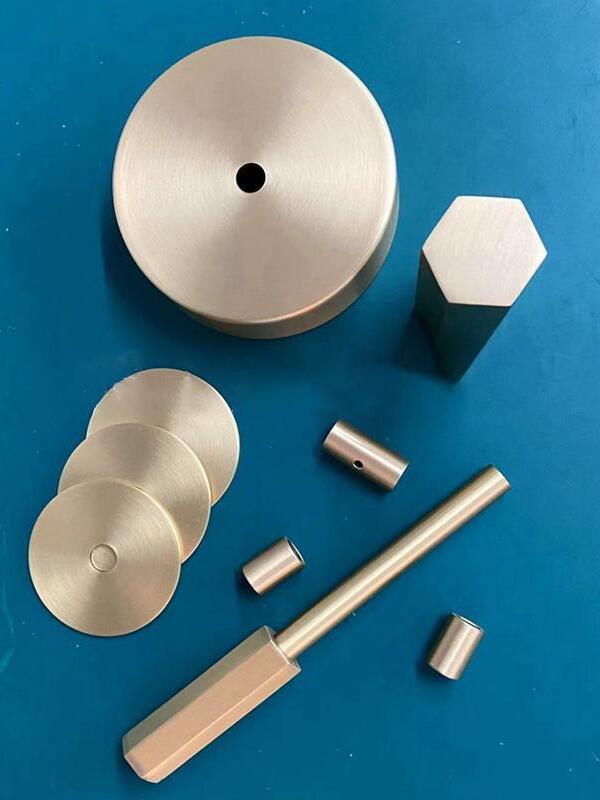 Brass-colour circular parts and stem components