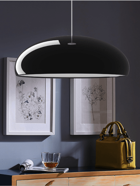 Glossy black dome above a console