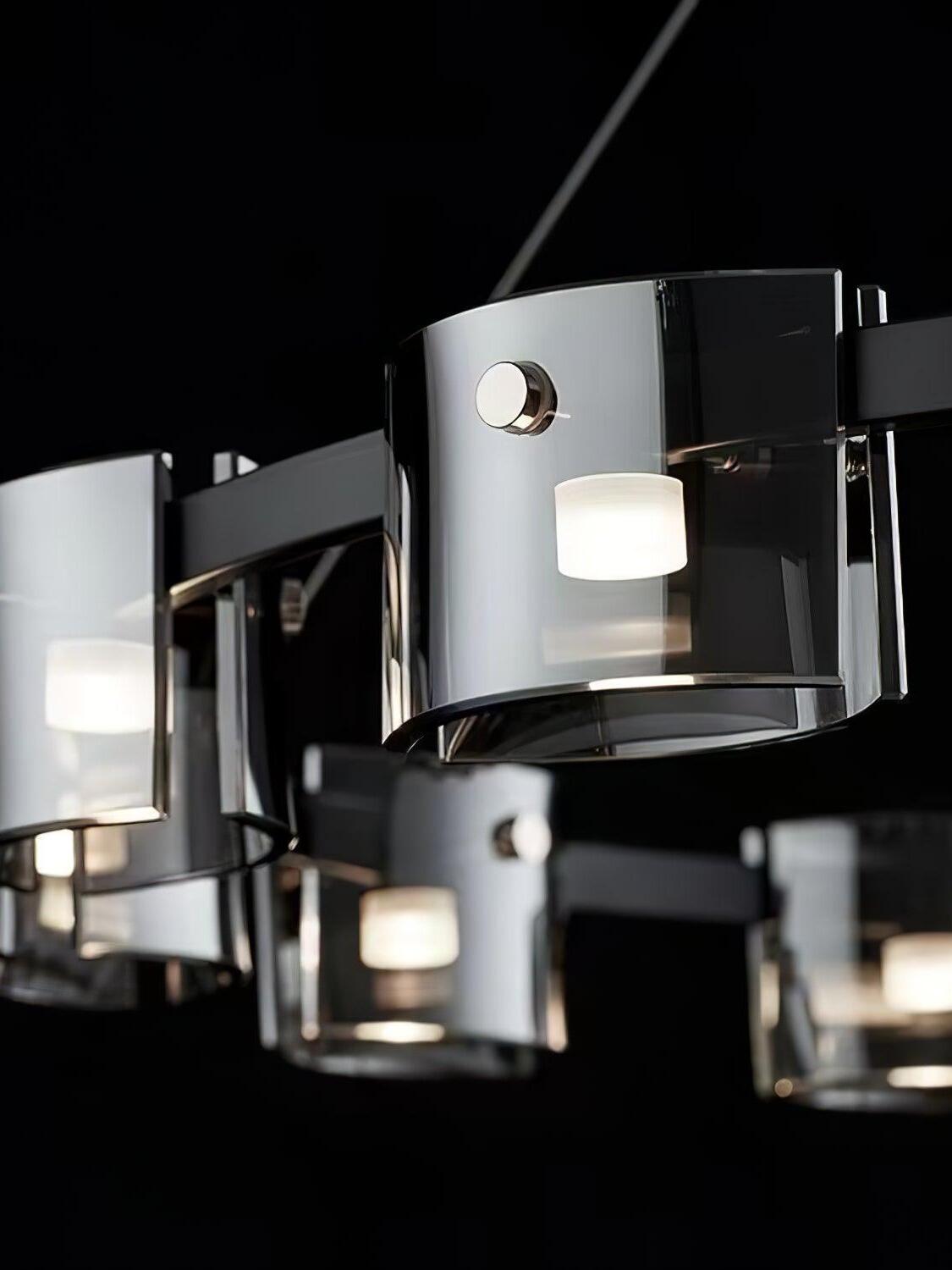Close view of smoky curved glass and round fasteners