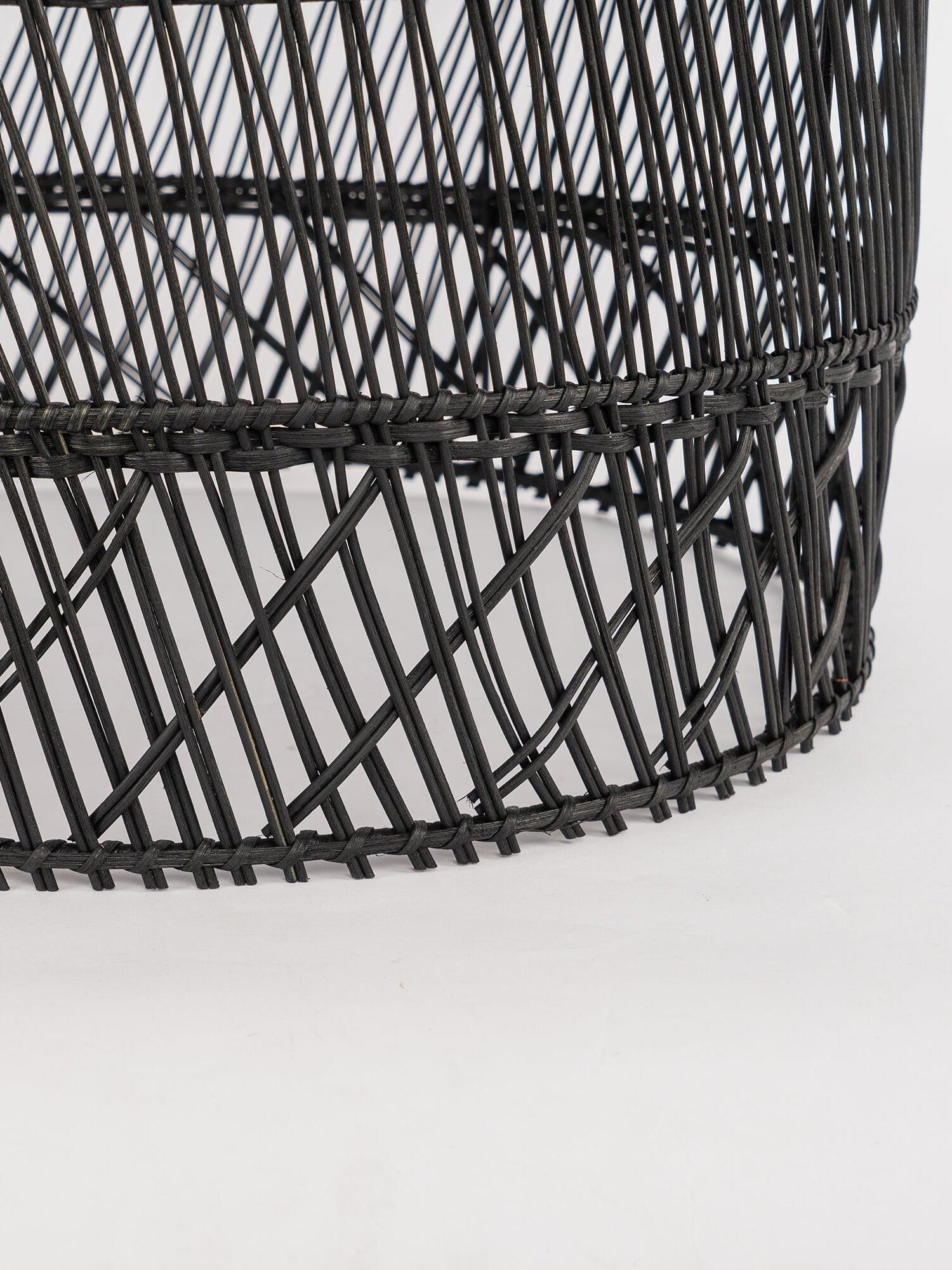 Lower edge and diagonal weave of a Black shade