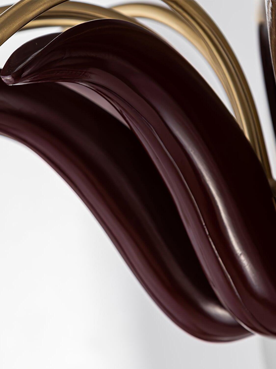 Glossy deep red central leaf-shaped detail