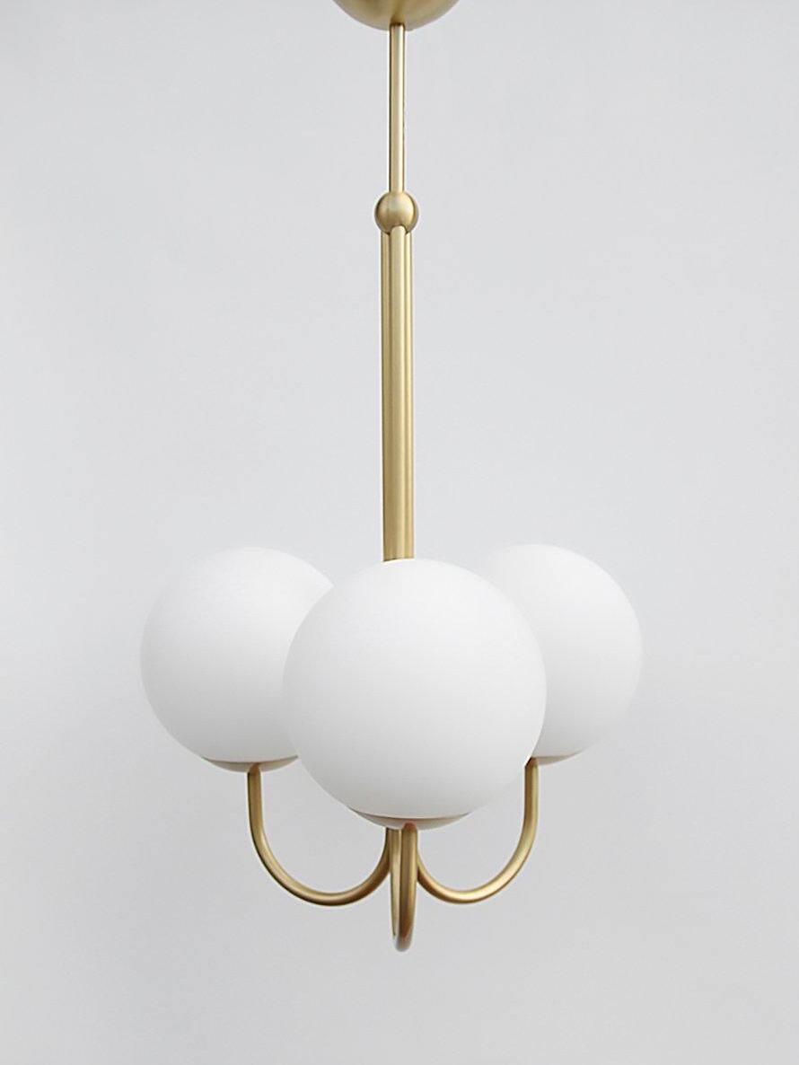 Three White globes and polished curved arms