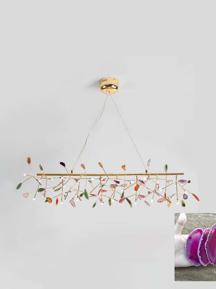 Long linear reference chandelier with purple-toned stone inset