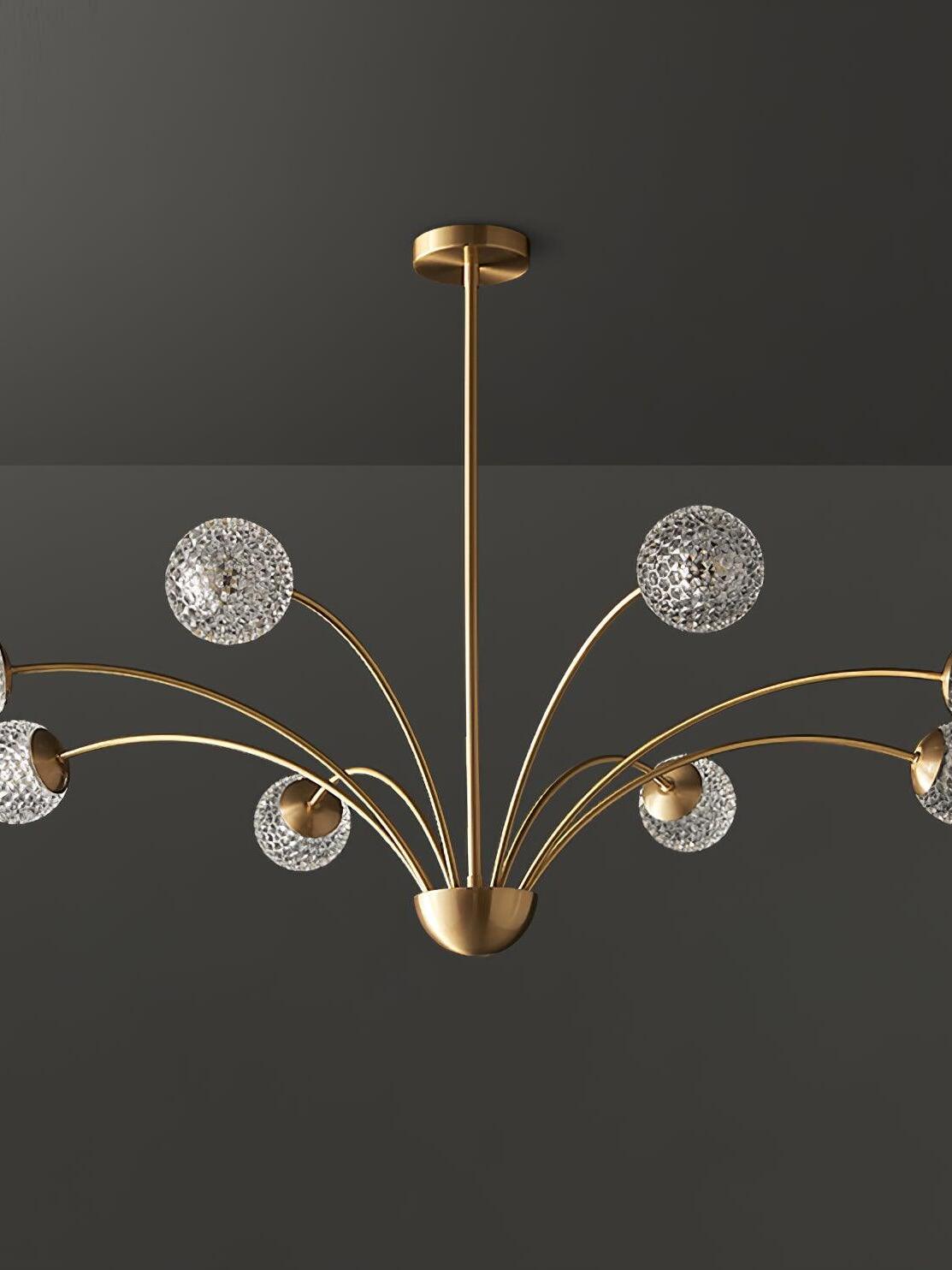 Unlit textured glass globes on curved brass-tone arms around a central bowl-shaped hub