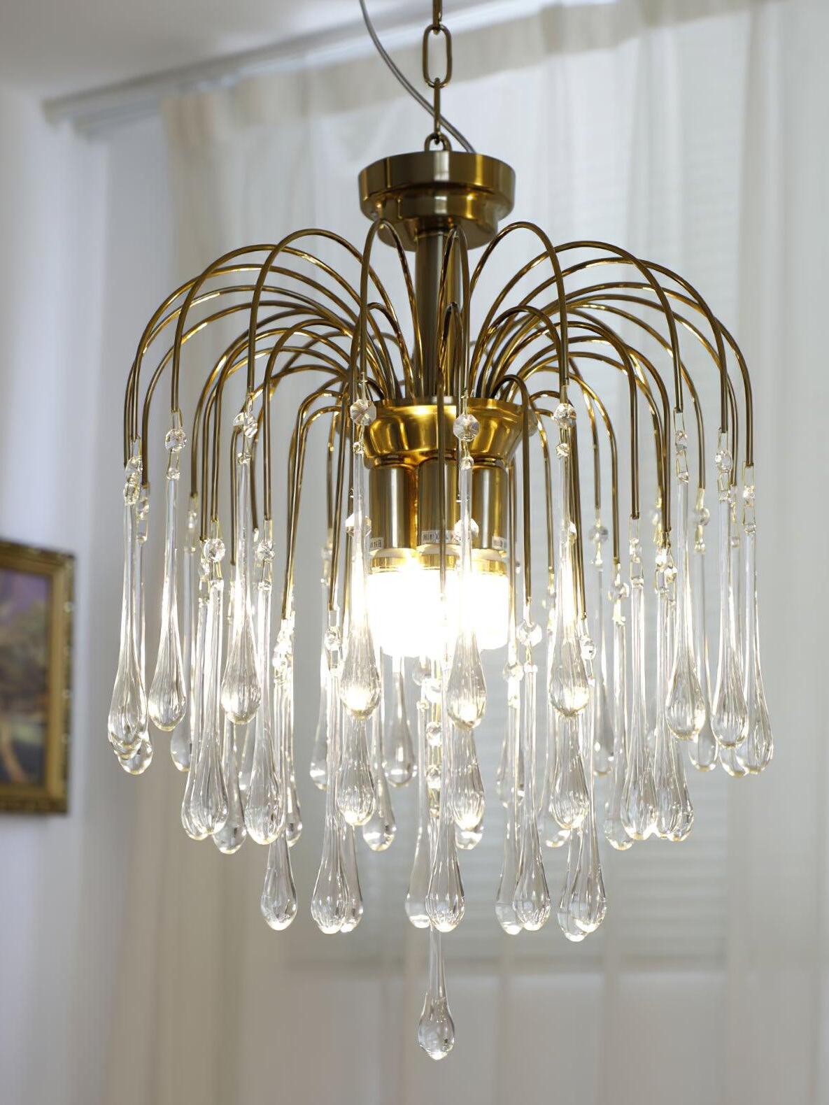 43 cm Clear chandelier with transparent drops around glowing bulbs