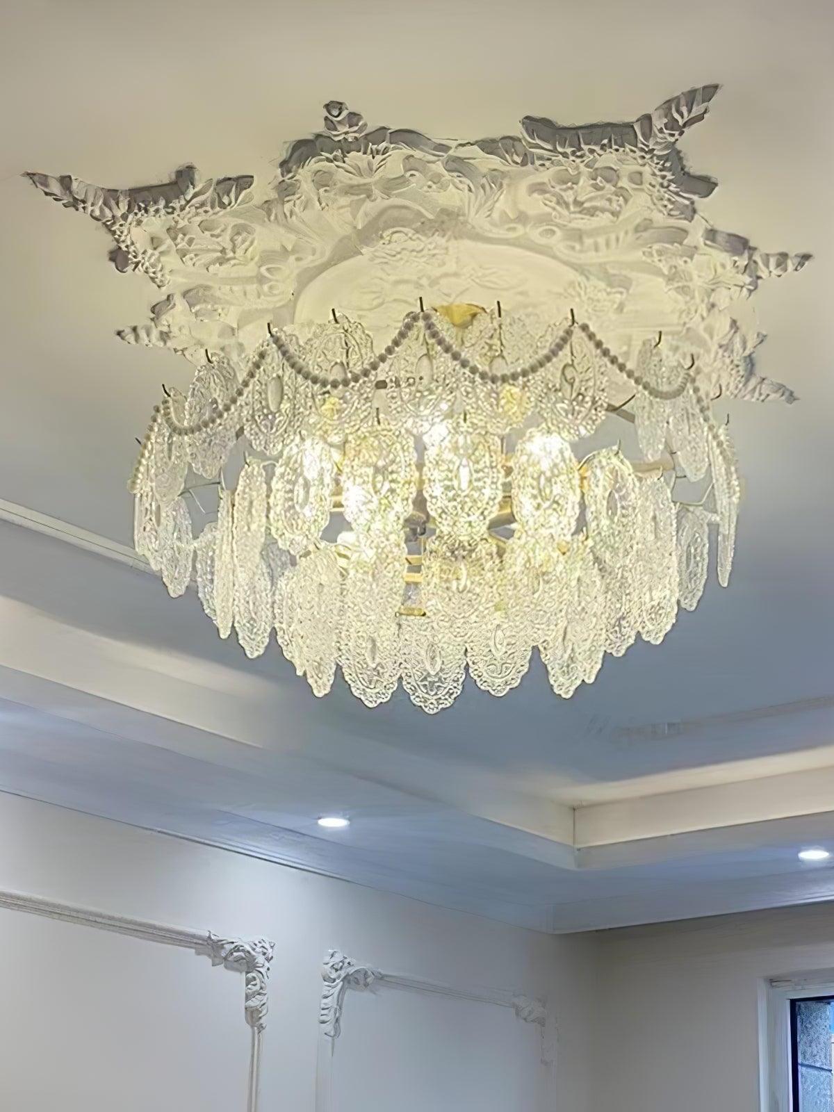 Large clear-ornament chandelier near ceiling and window