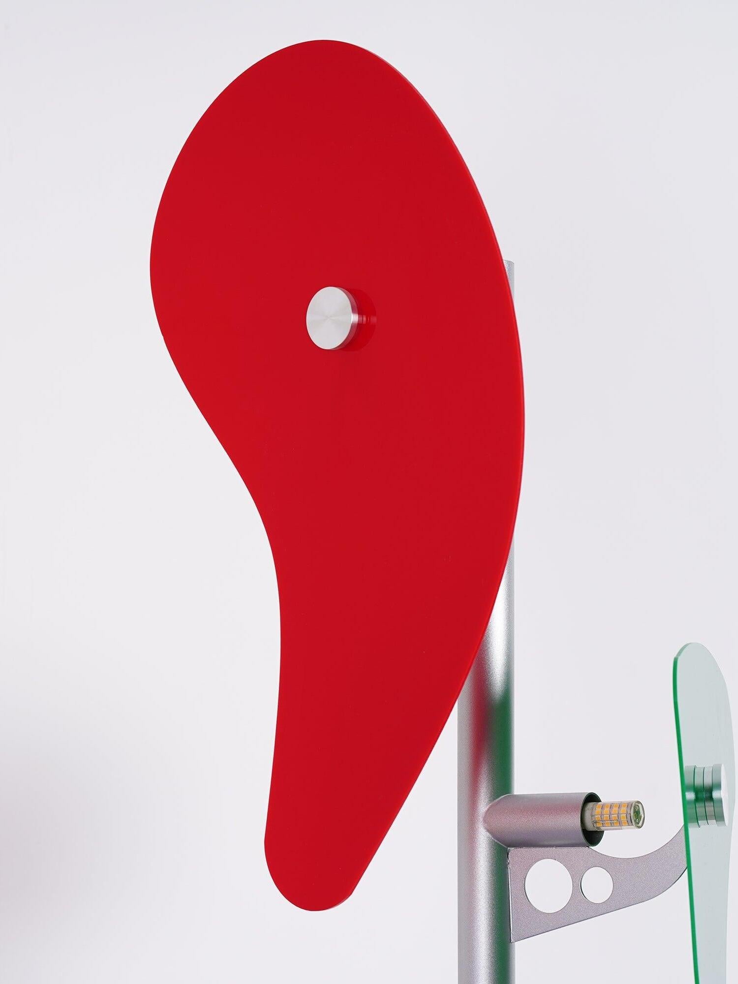 Red curved panel and central fastener
