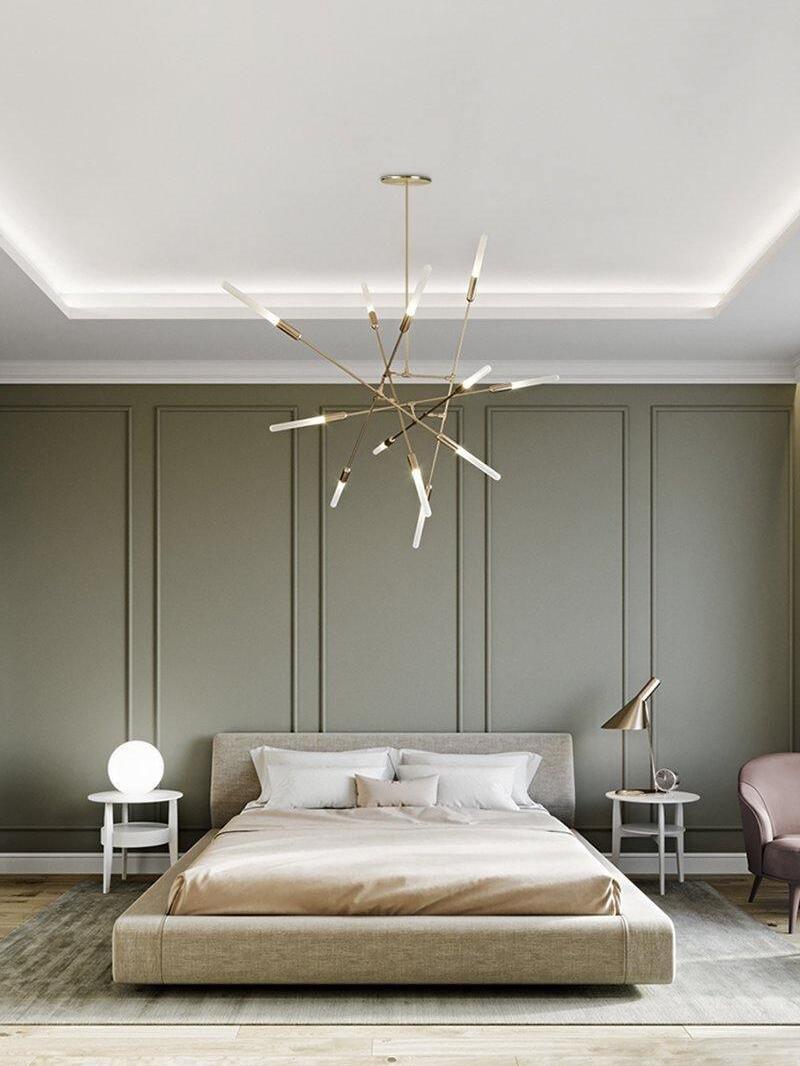 Gold branching fixture above a bedroom
