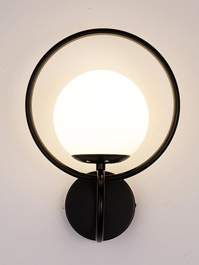 Front view of glowing globe within black oval ring