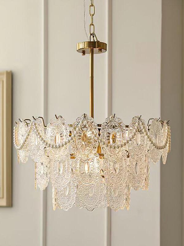 Gold chandelier with rod and short chain segment pictured