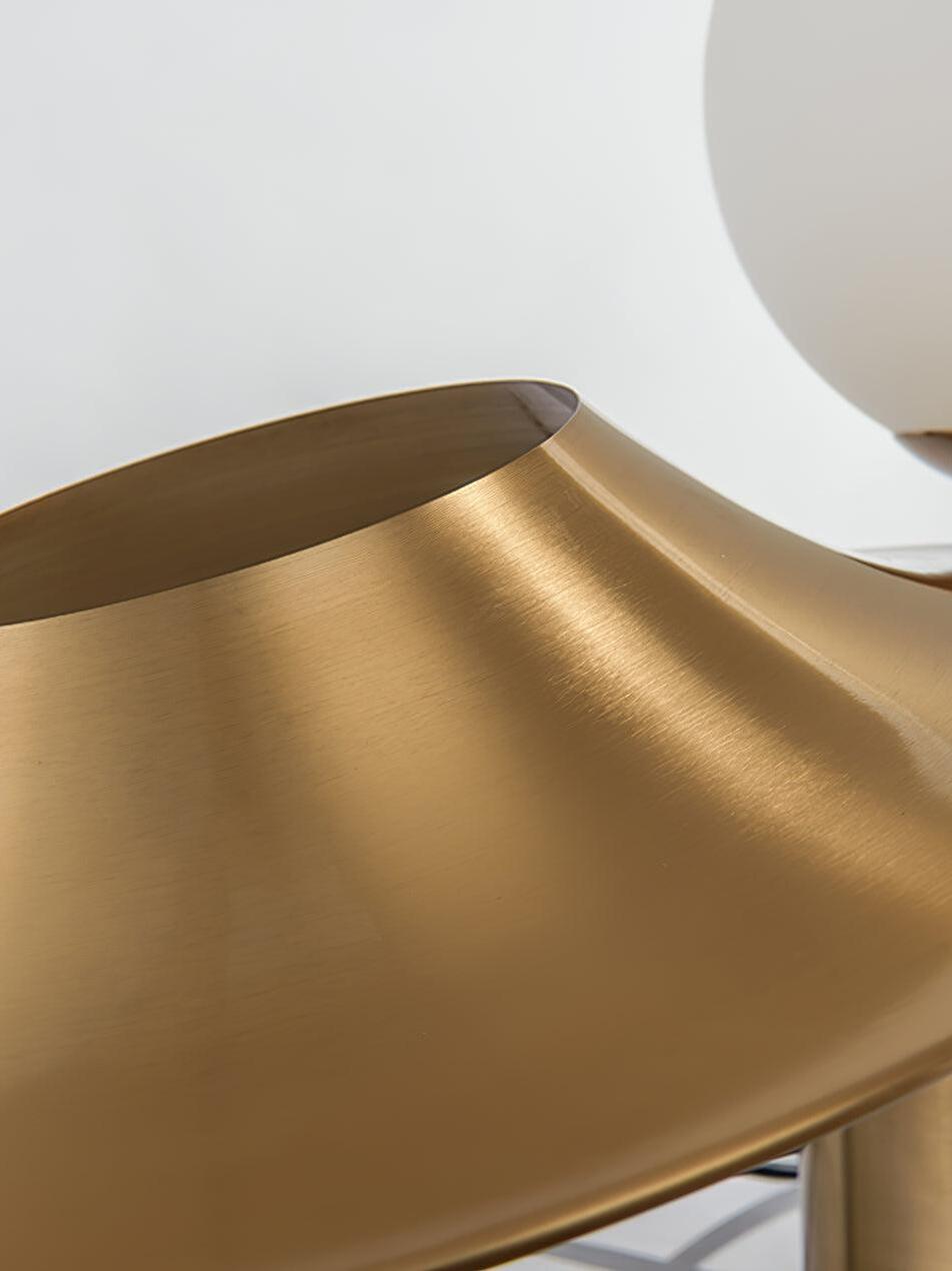 Close edge of smooth curved gold metal disc