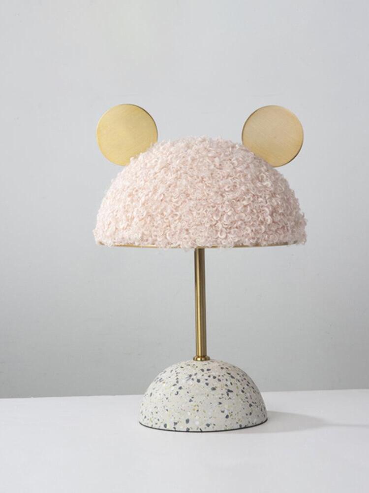Pale pink plush domed shade with gold-tone discs above light speckled base