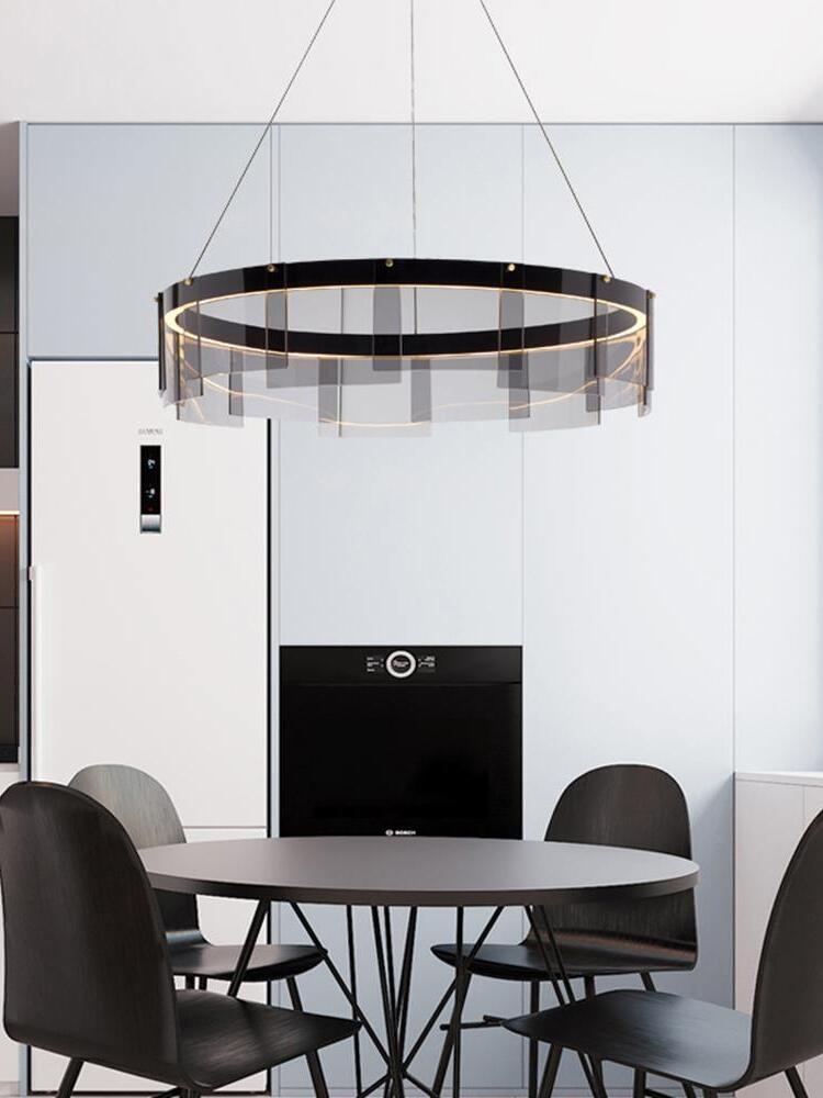 Stratos chandelier over a round dining table