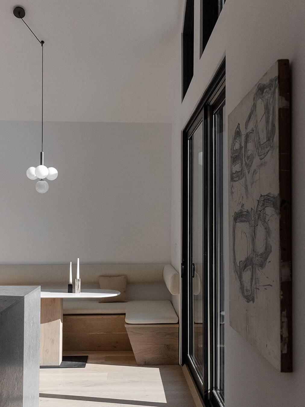 Small globe cluster in a pale kitchen