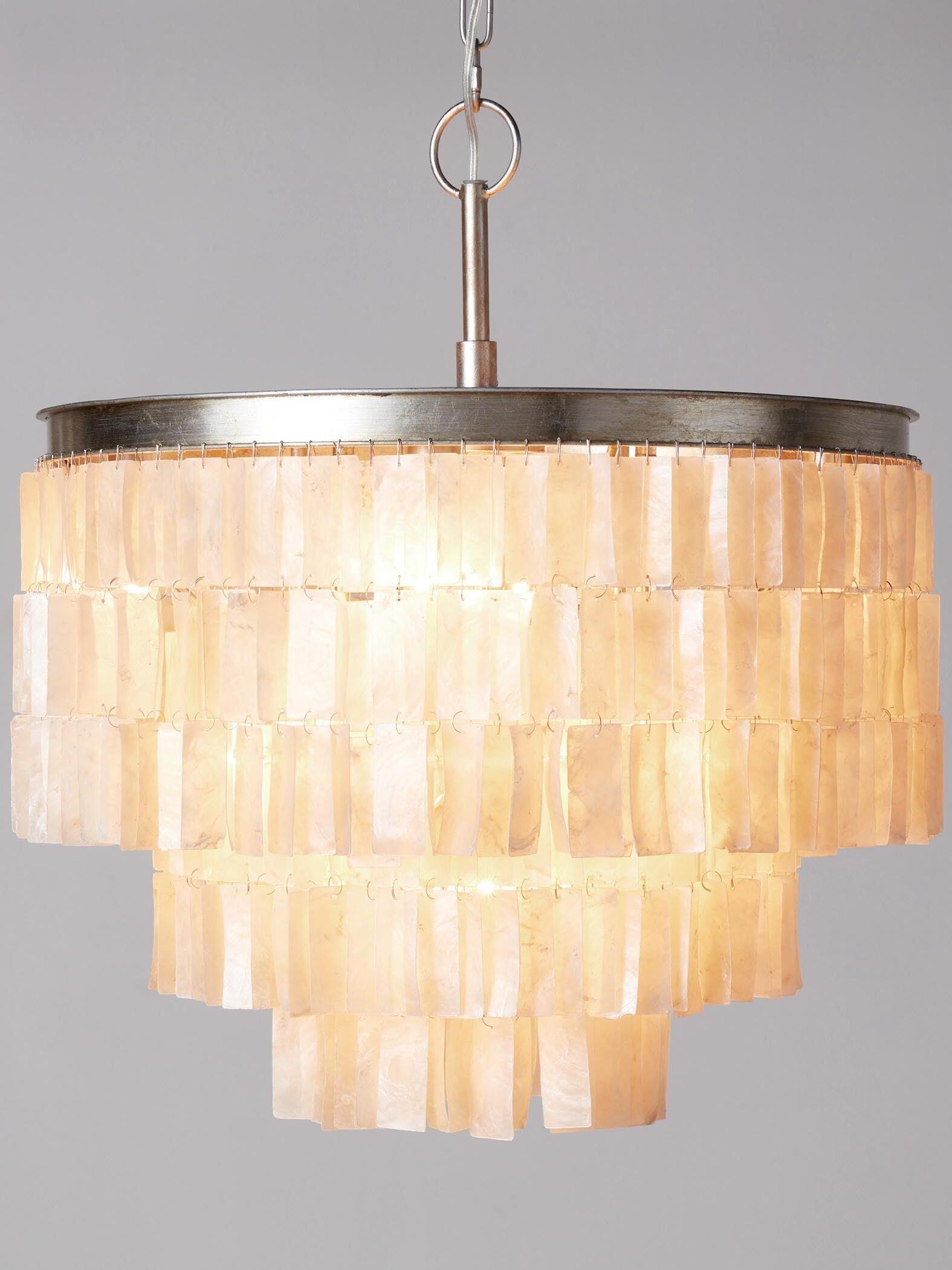 Close-up of glowing shell pieces arranged in tiers