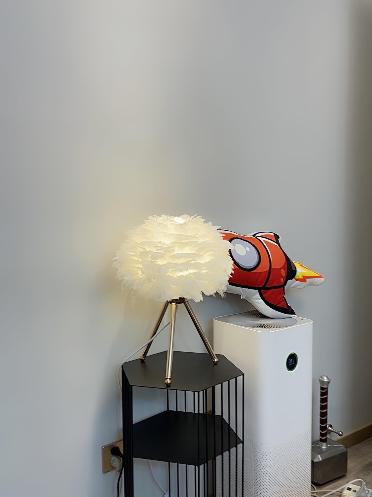 White feather lamp on dark open storage unit