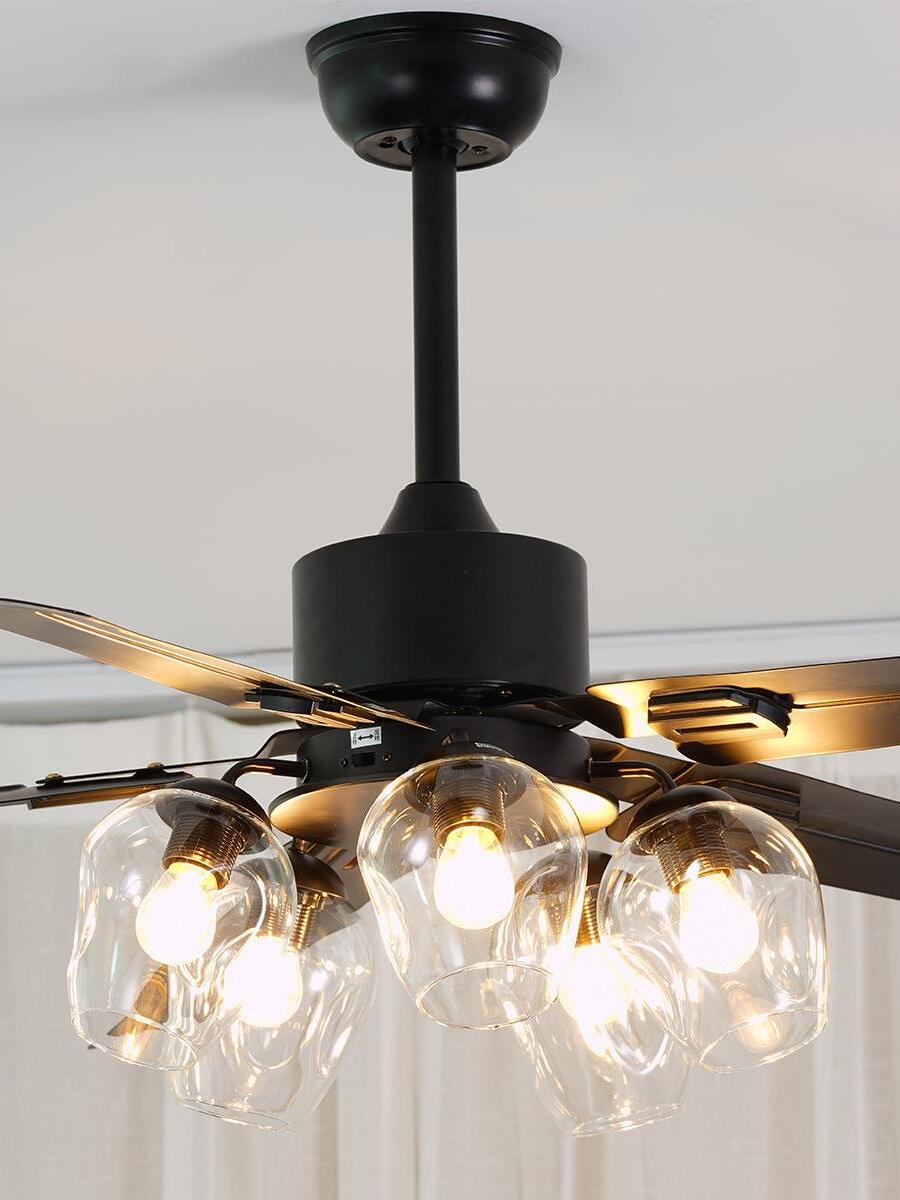 Motor housing and glass light cluster beneath a rod