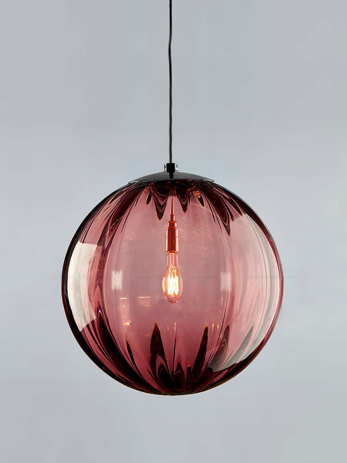Wine red fluted globe with visible filament-style bulb