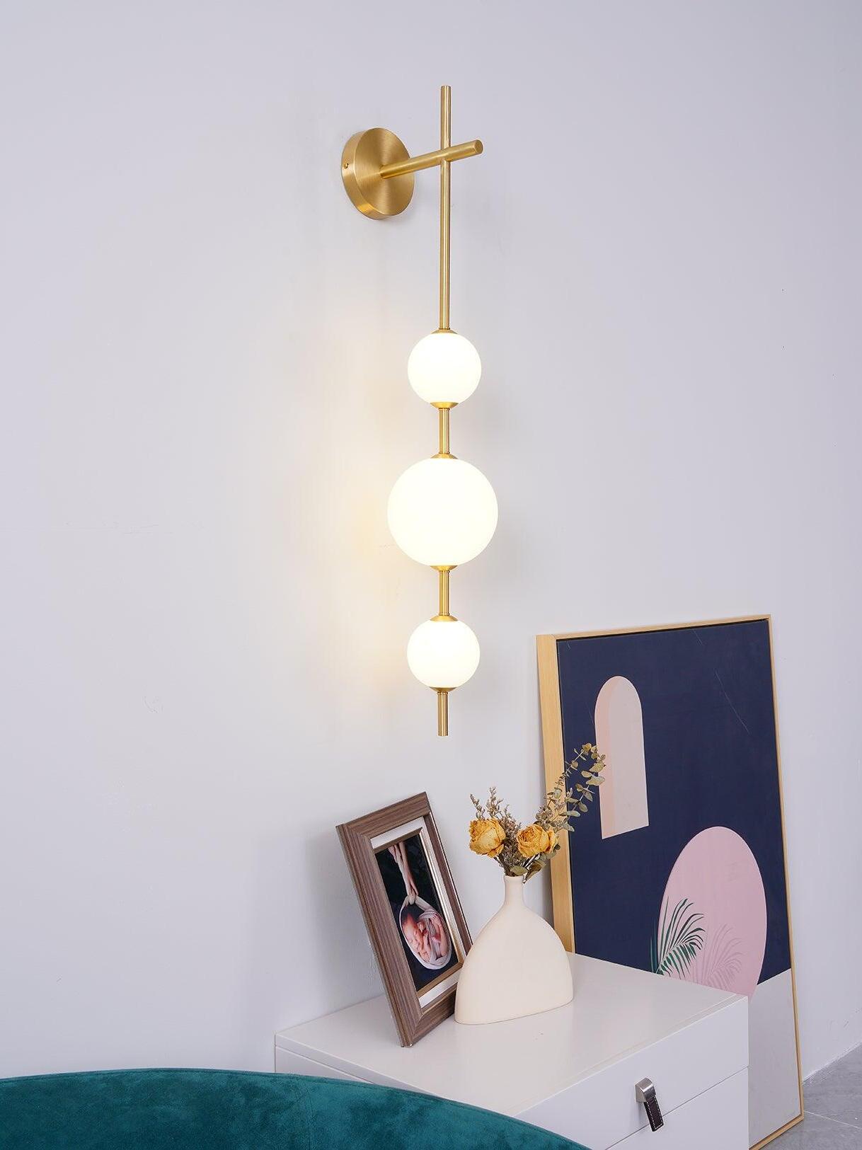 Delicate Glass Globe Vertical Brass Wall Lamp - Cueteks