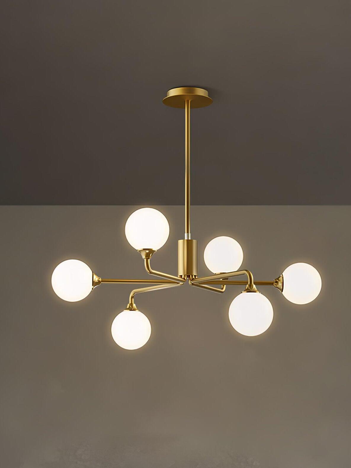 Six-globe branching chandelier viewed at an angle