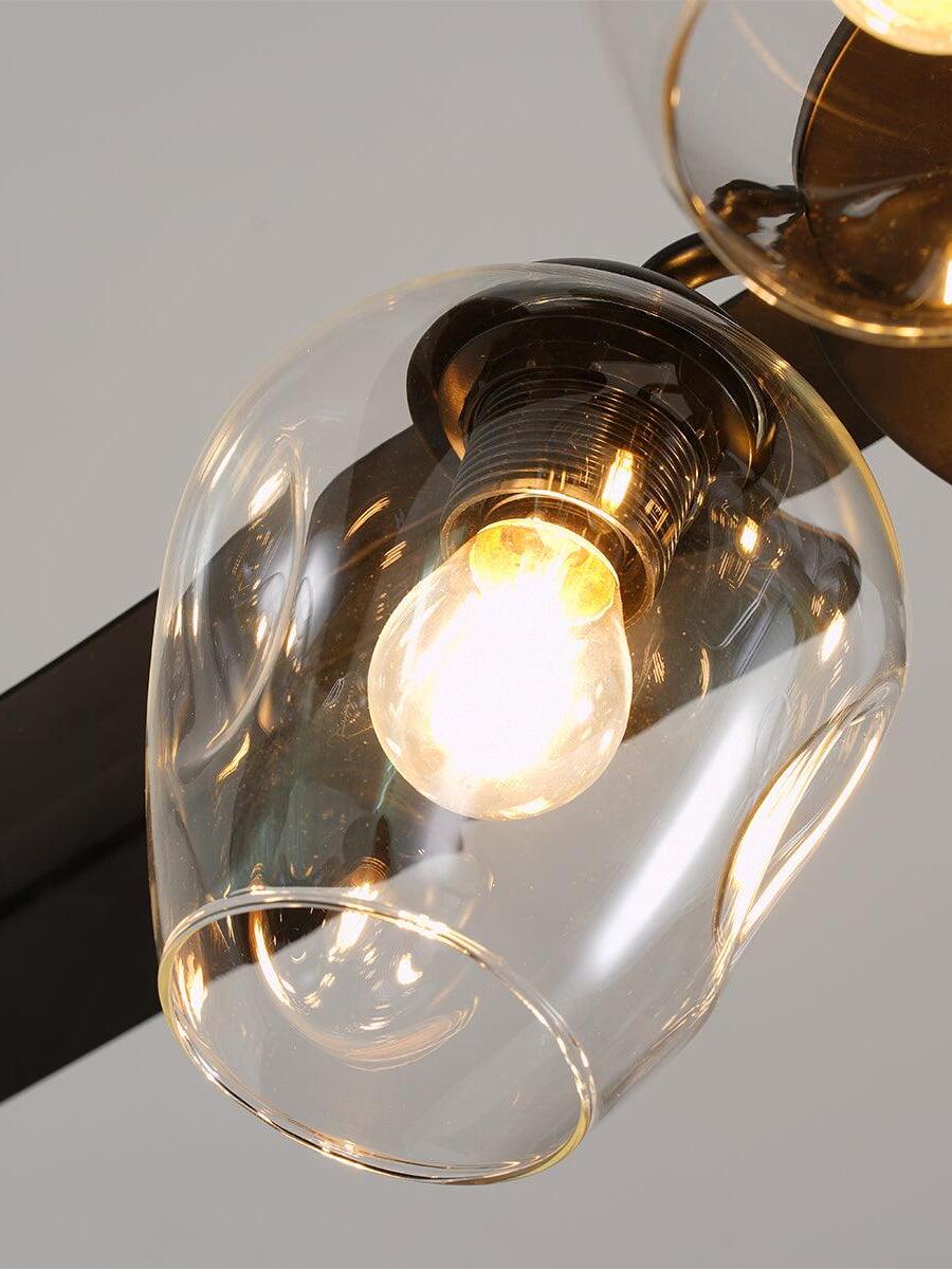 Close view of open rounded bell-shaped glass shade
