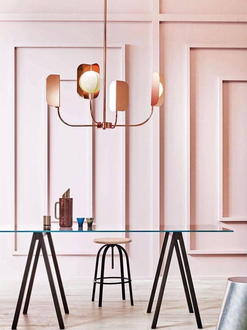 Small rose-gold-coloured LEAF above a tall table