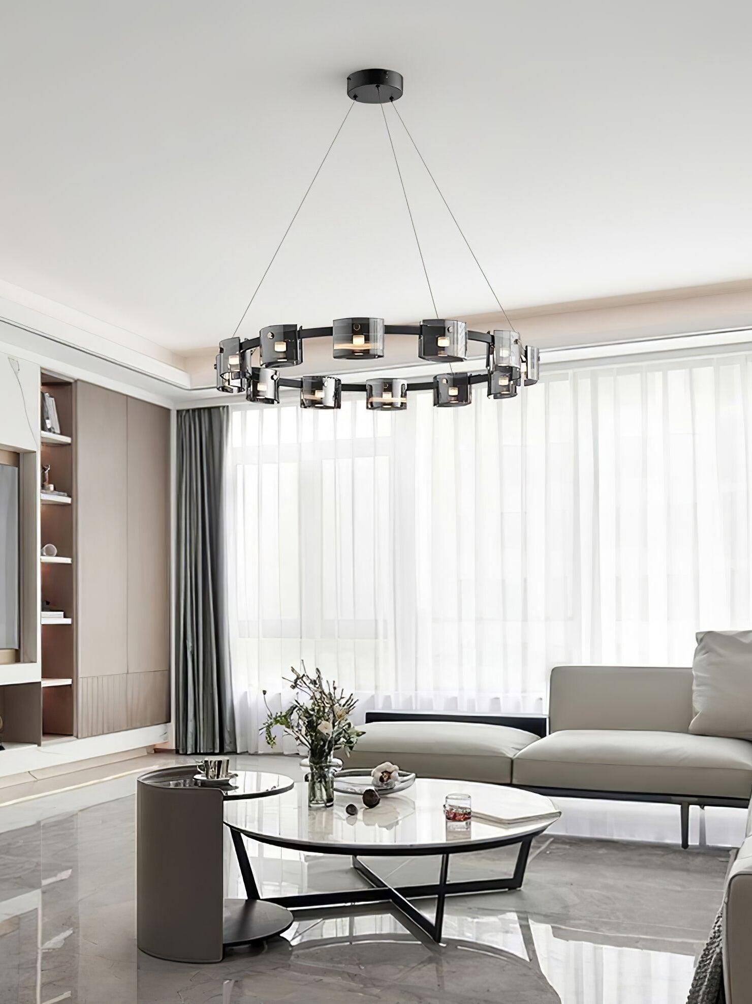 Black ring chandelier above a living-room table