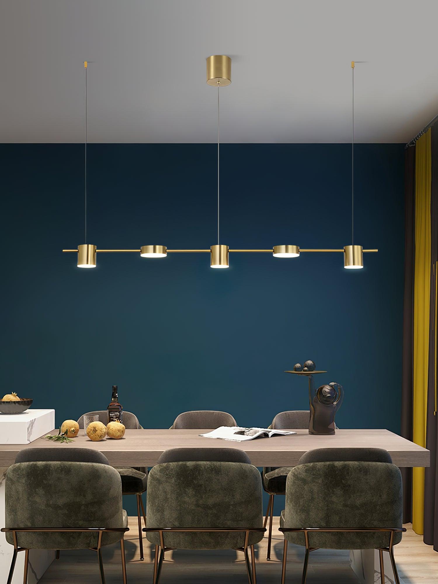 Gold alternating light forms above dining chairs
