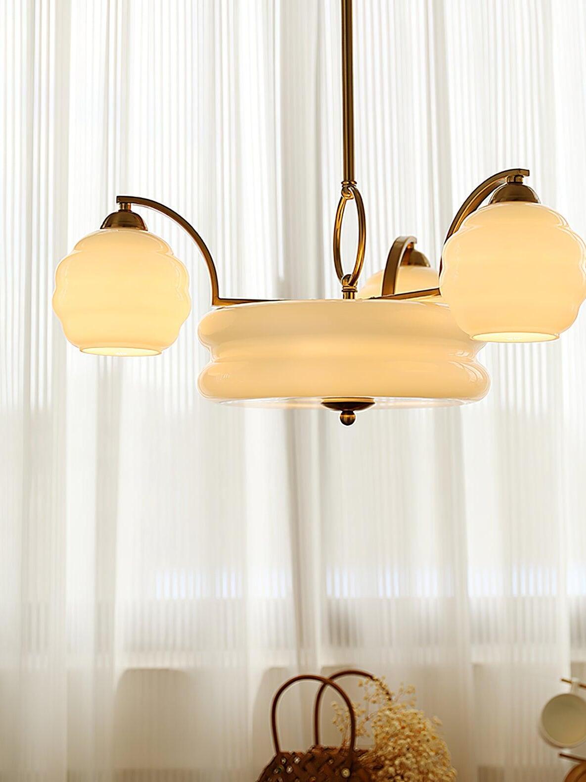 Gold-coloured arms with glowing rounded shades
