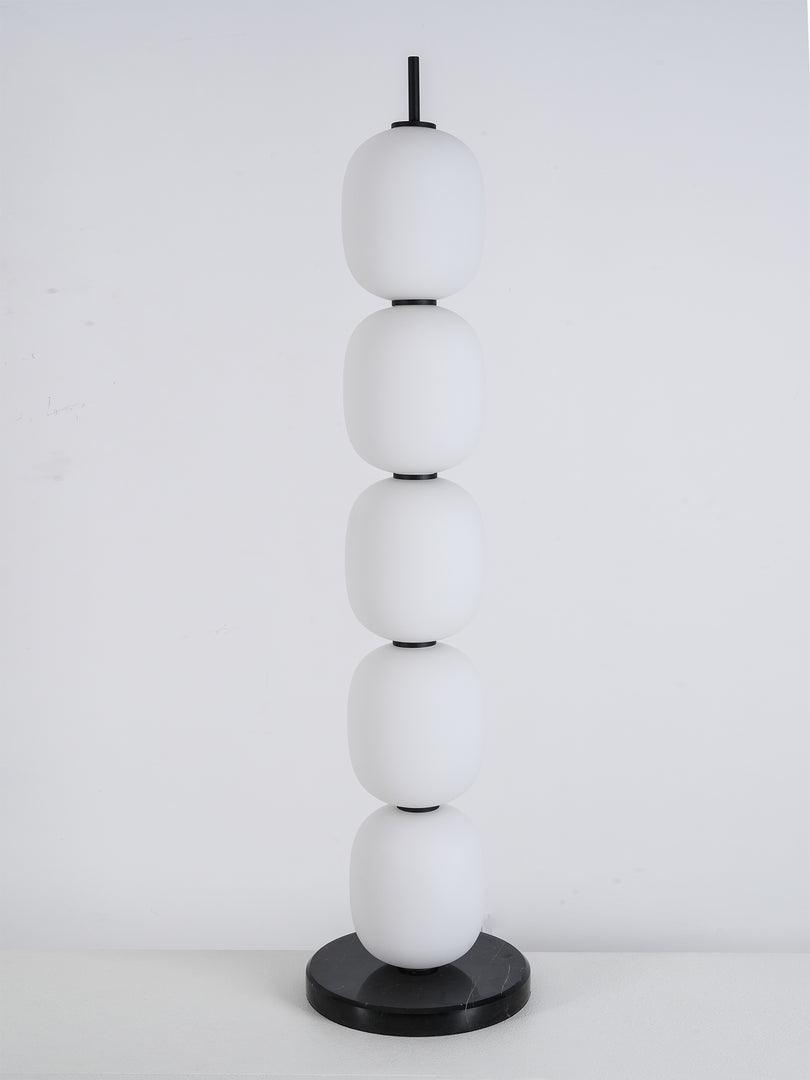 Unlit five-globe lamp on grey background