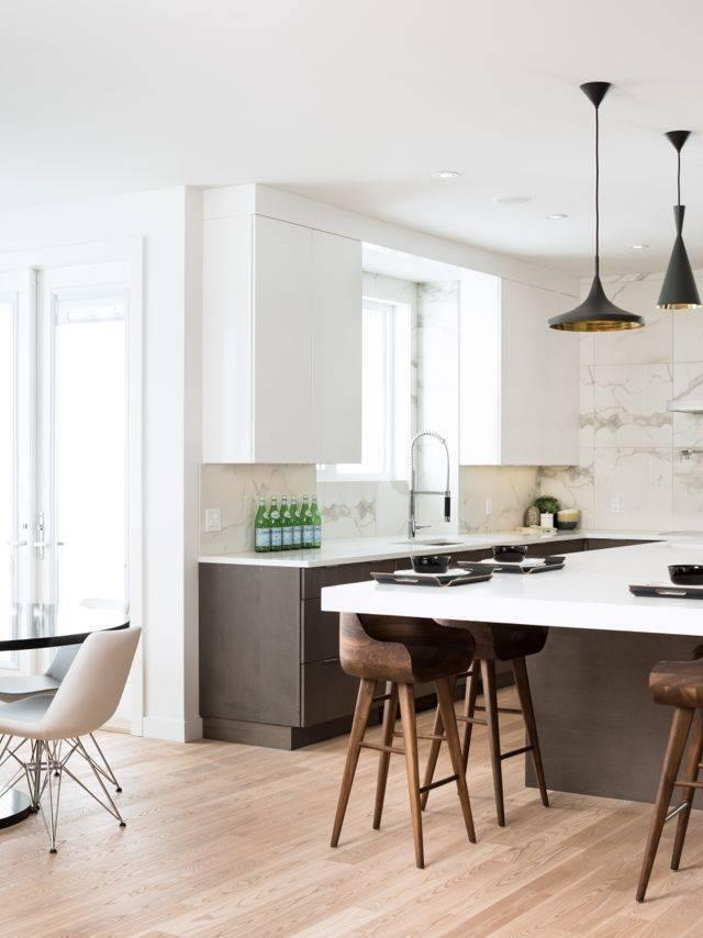 Black cone and wide shades in a bright kitchen