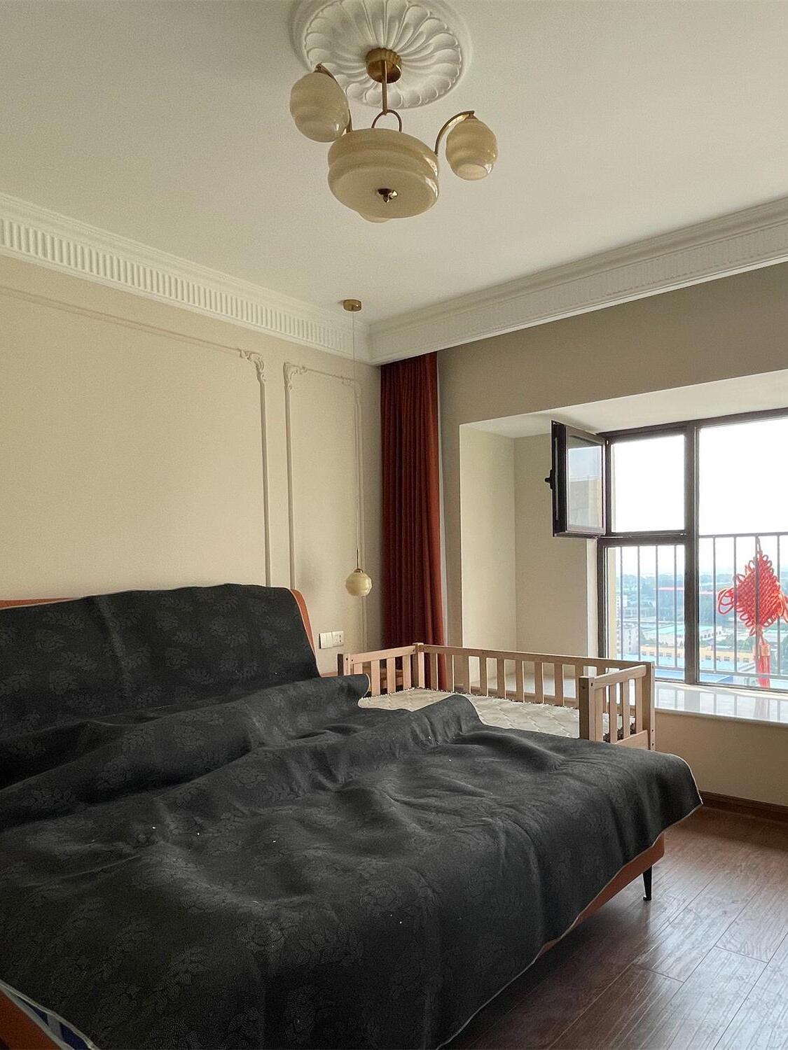 Glass chandelier in a bedroom setting