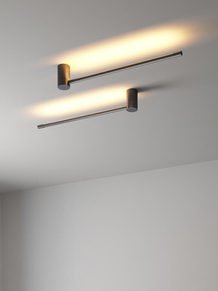 Two horizontal rods with light washing the ceiling
