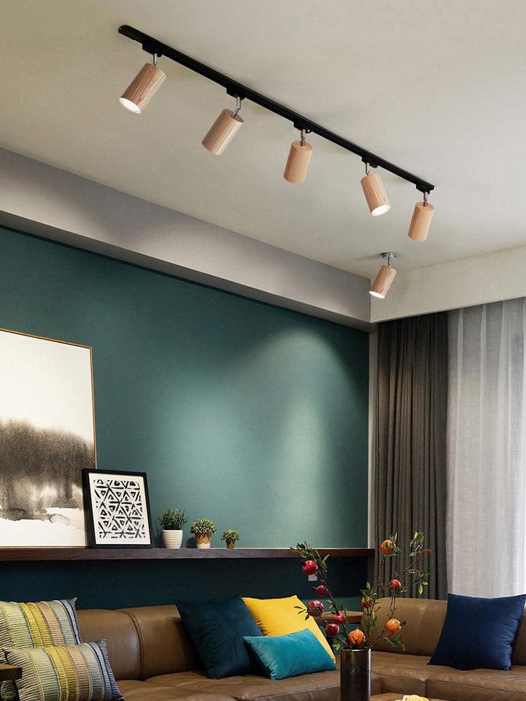 Wooden track spotlights on living-room ceiling