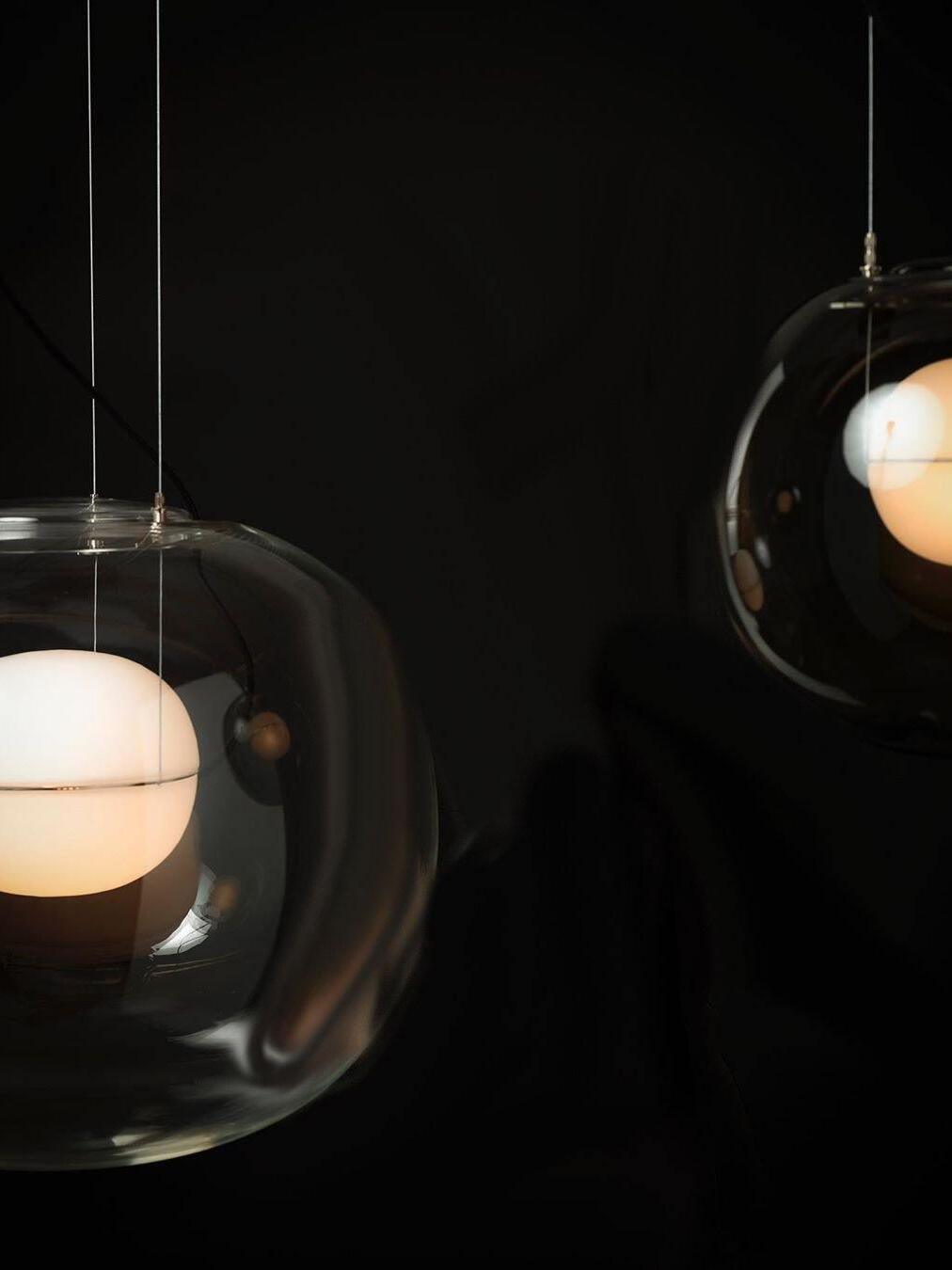 Close-up of a lit inner sphere within dark glass
