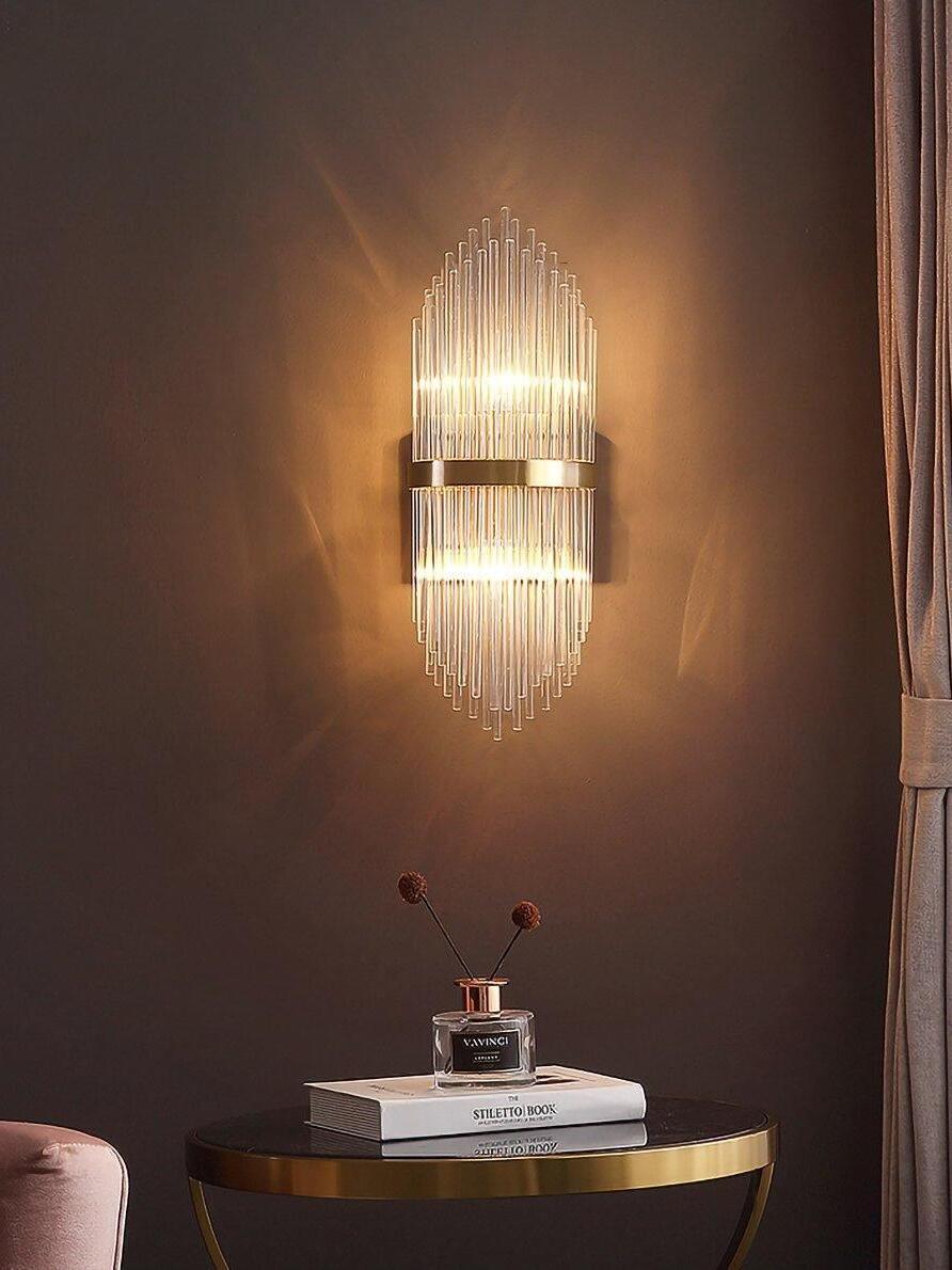 Warm crystal rod wall light above small round table