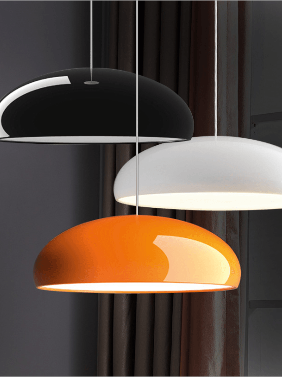 Black white and orange shallow domes displayed together
