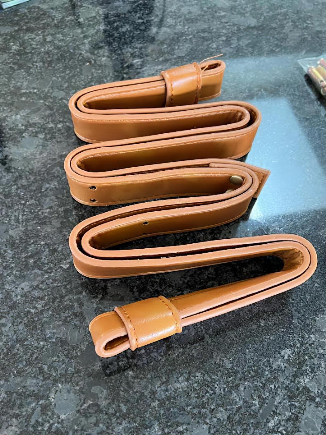 Stitched Brown suspension strap detail
