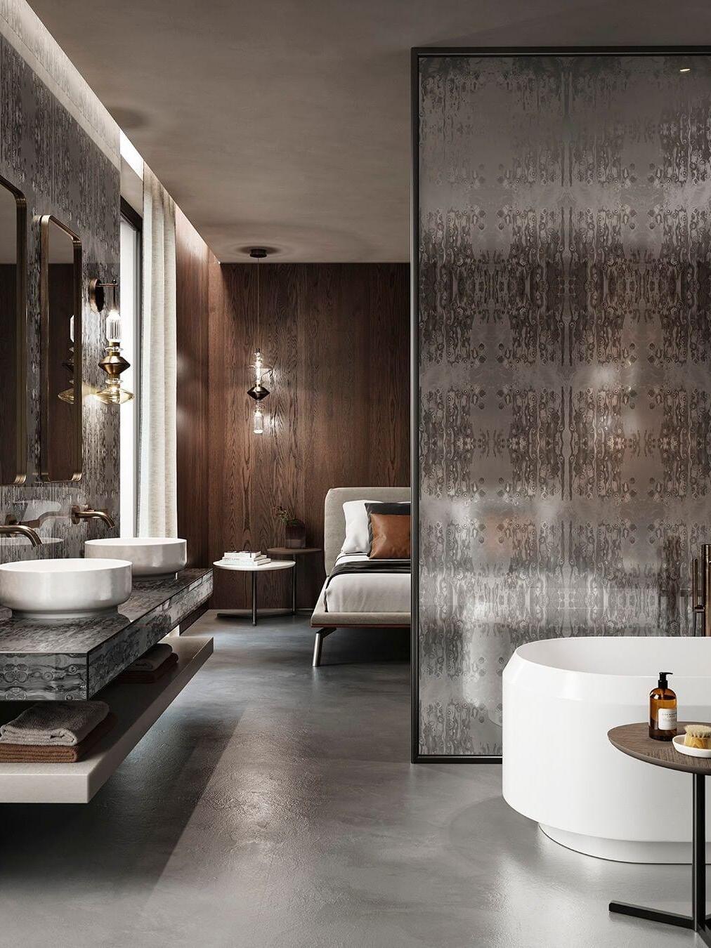 Glass pendants seen between bathroom and bedroom