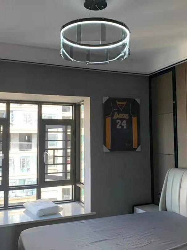 Illuminated glass ring in a bedroom