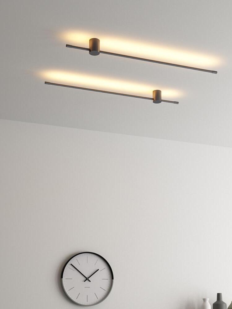 Two horizontal linear lights near a ceiling corner