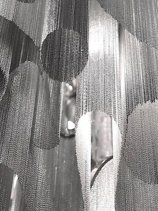 Close-up of fine chain curtain texture